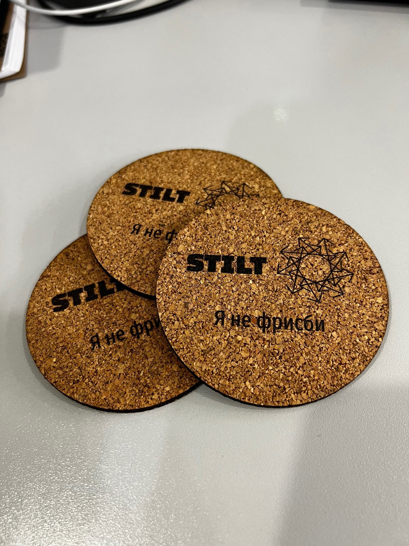 Блокноты, коврики для мыши, ручки и костеры для компании STILT