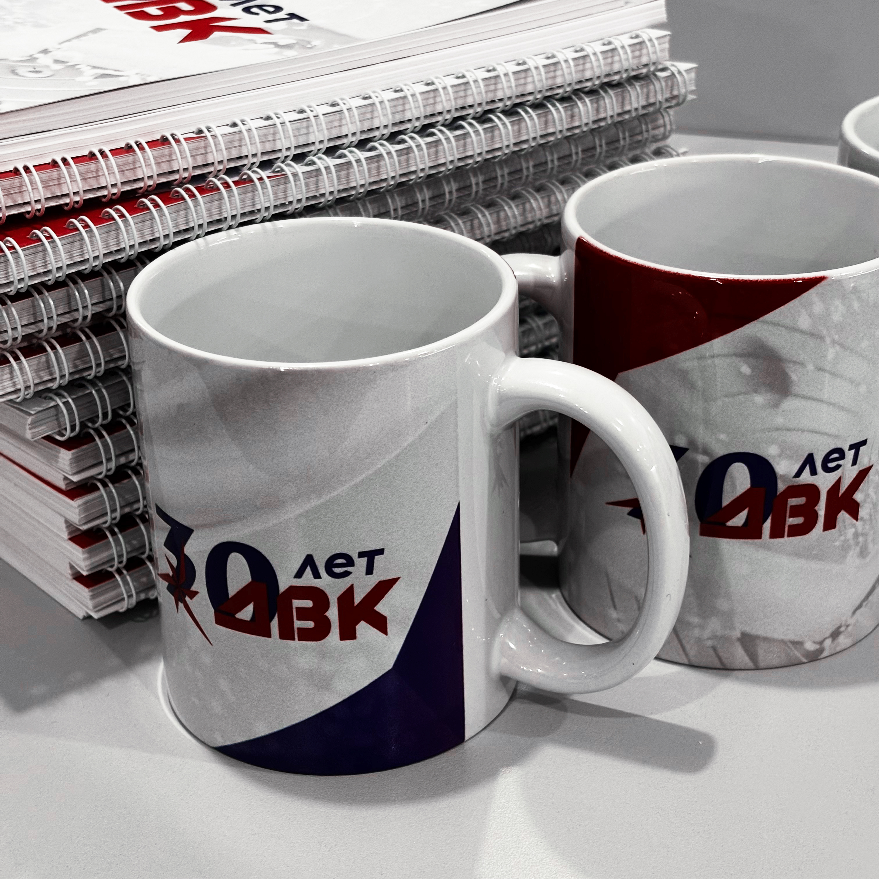 Блокноты, ручки, кружки, календари для компании ДВК