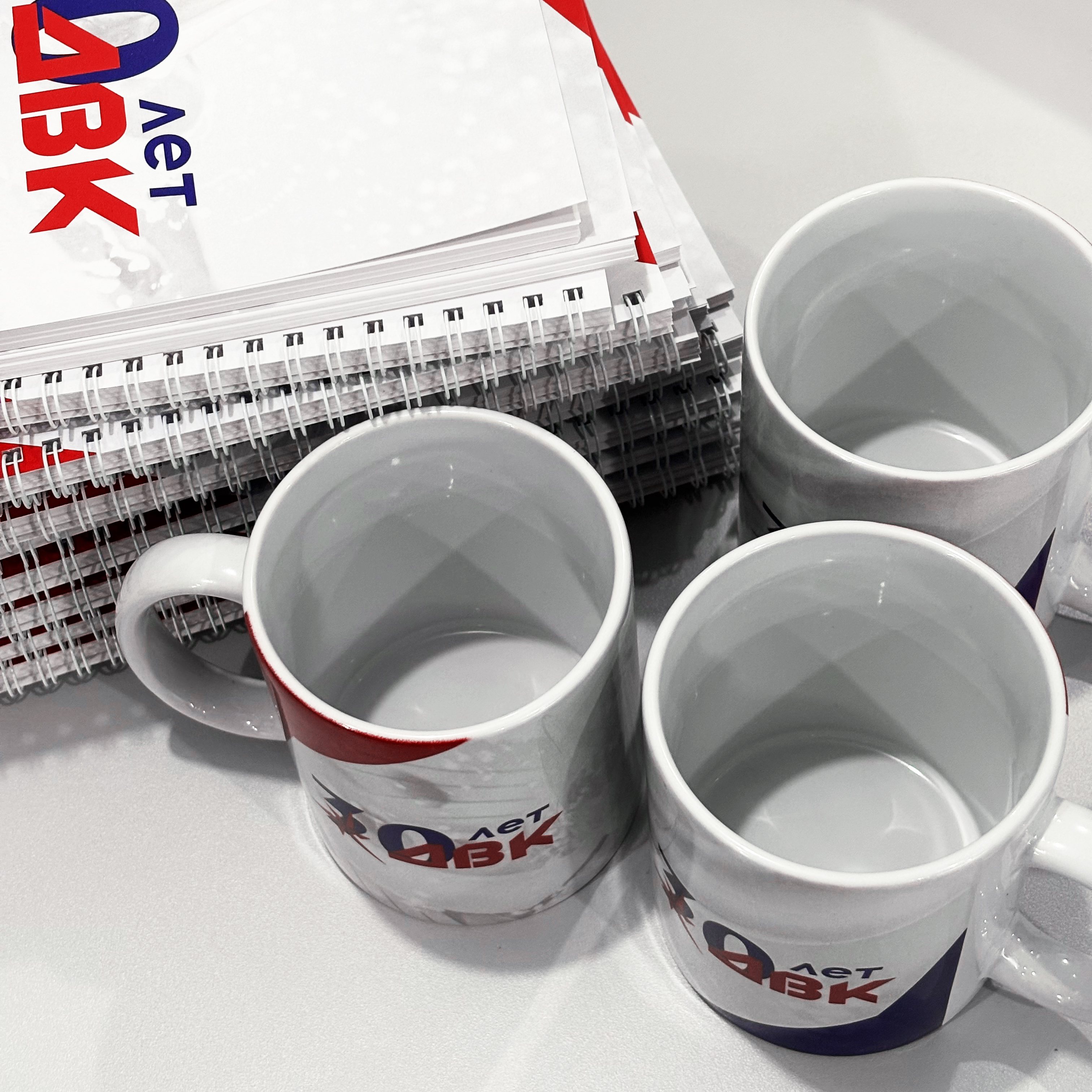 Блокноты, ручки, кружки, календари для компании ДВК